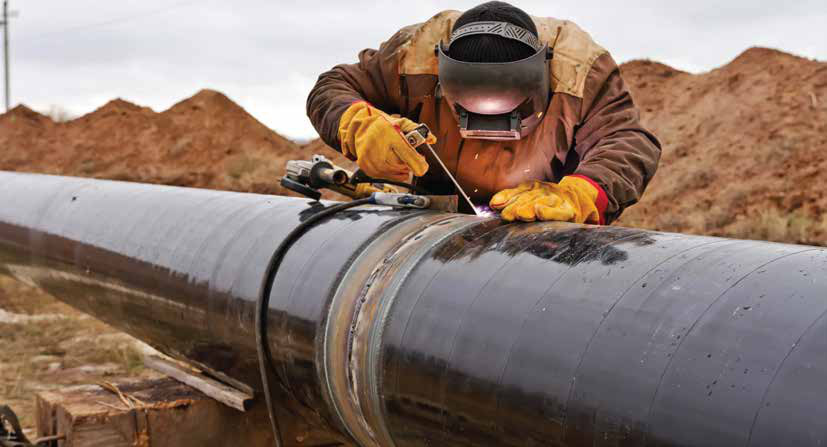 Welder working on a pipeline